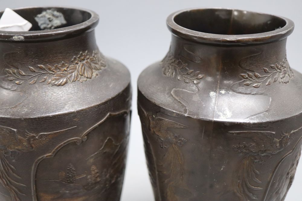 A pair of Chinese bronze vases, height 24cm